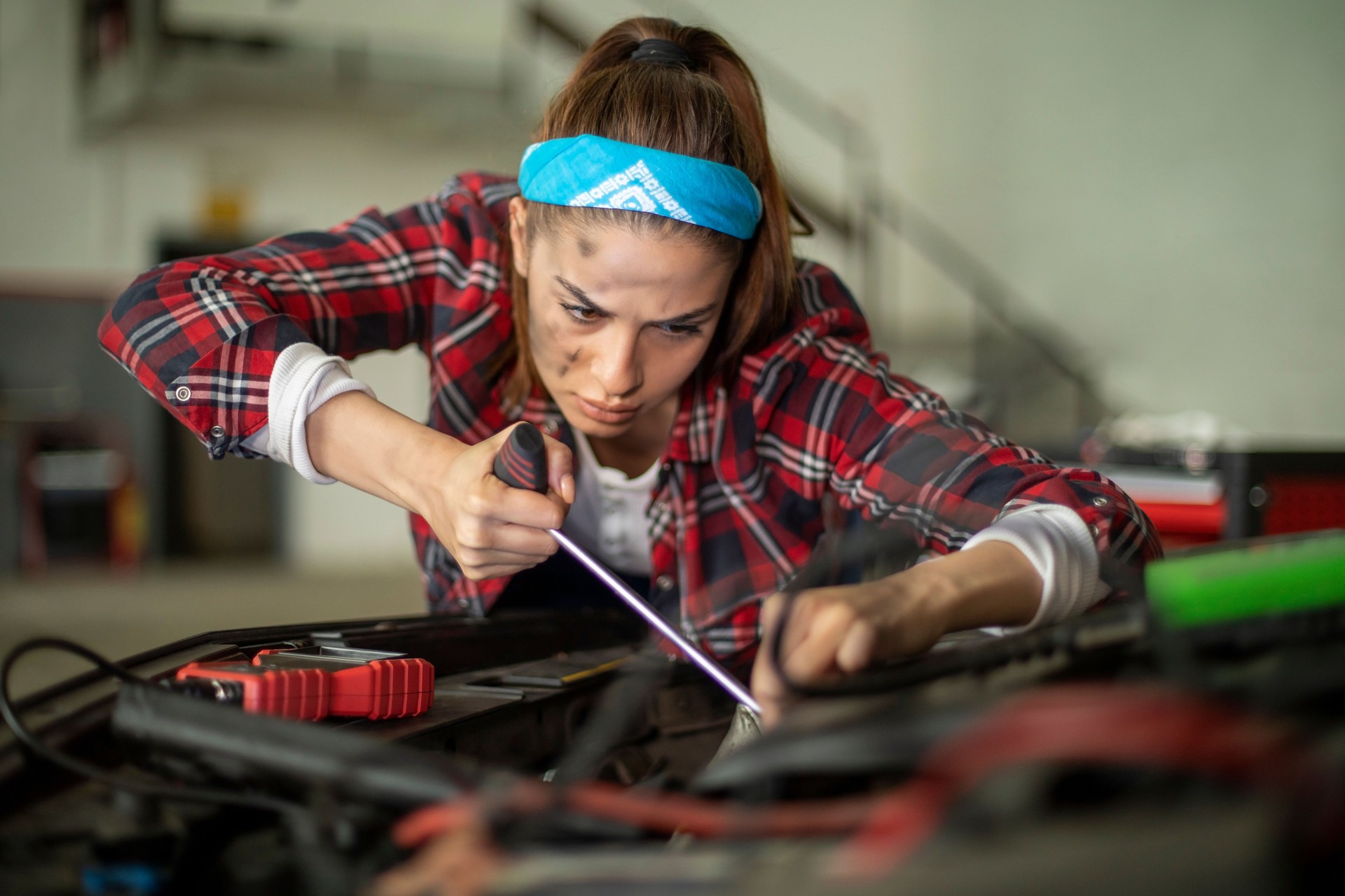 Beautiful woman mechanic